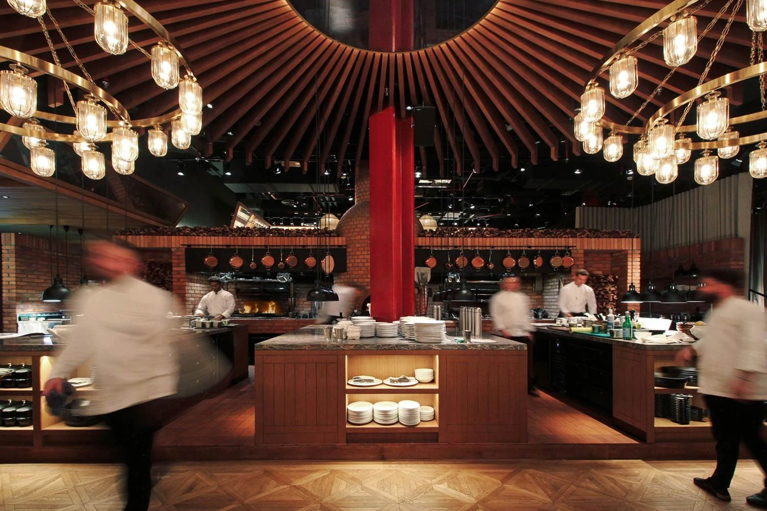 Chefs working in The Guild Dubai's stylish kitchen.