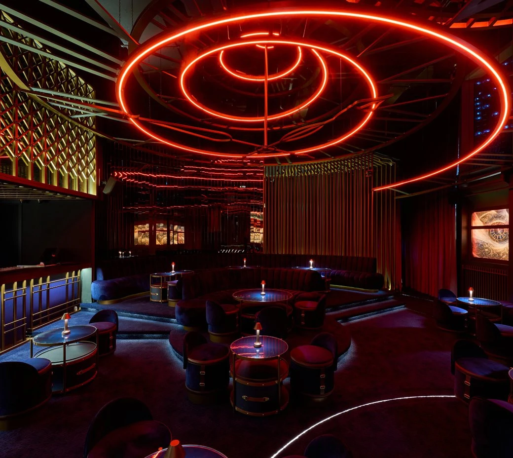 Amelia Restaurant & Lounge in Dubai with modern red lighting design.