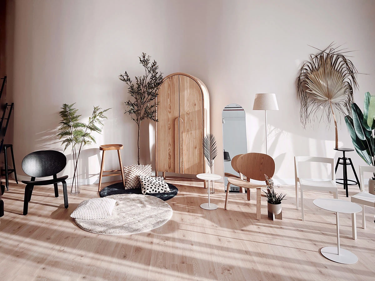 Modern seating area with plants at LUMA Studio, Dubai.