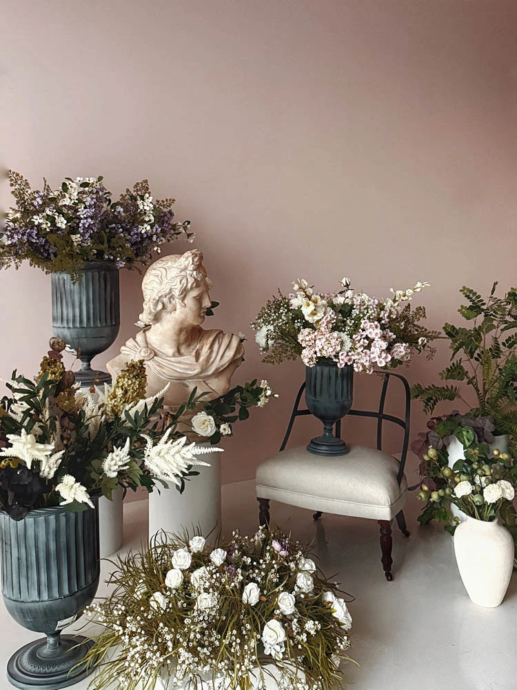 Elegant floral arrangements and sculpture at LUMA Studio, Dubai.