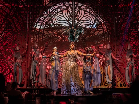 Performers in elaborate costumes on stage at Babylon Difc, Dubai.