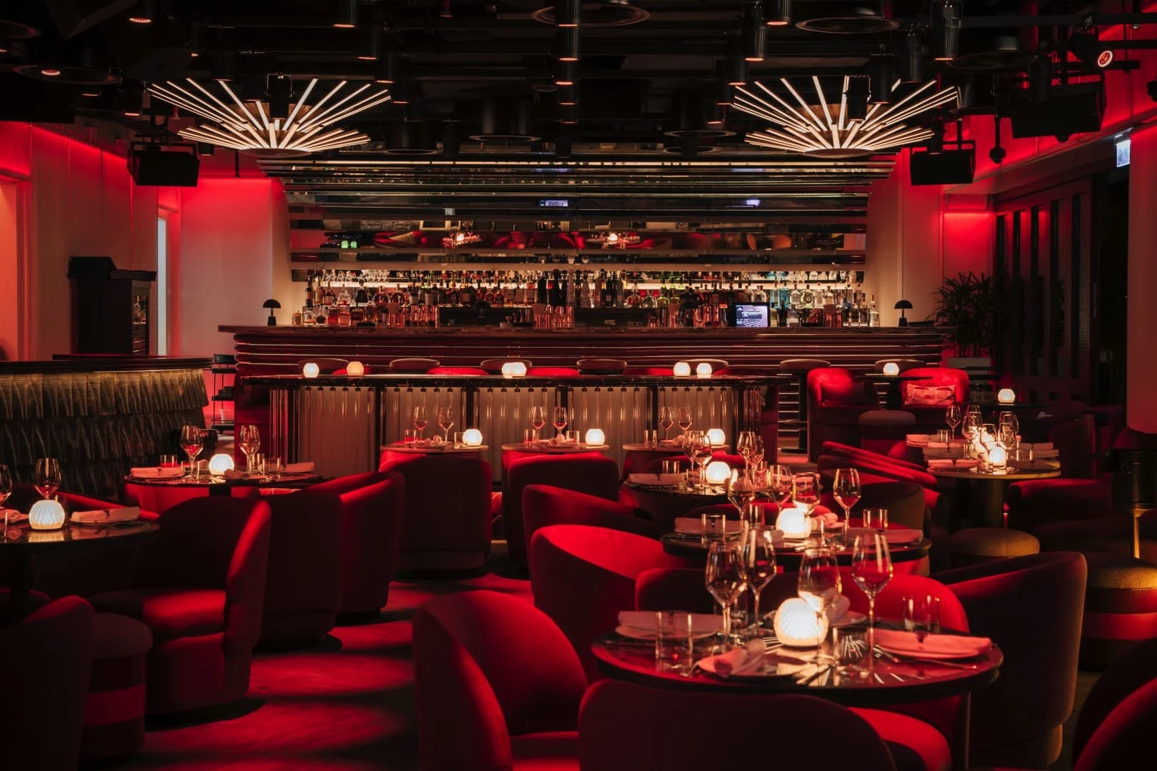 Luxurious dining area at Babylon Difc, Dubai with ambient lighting.
