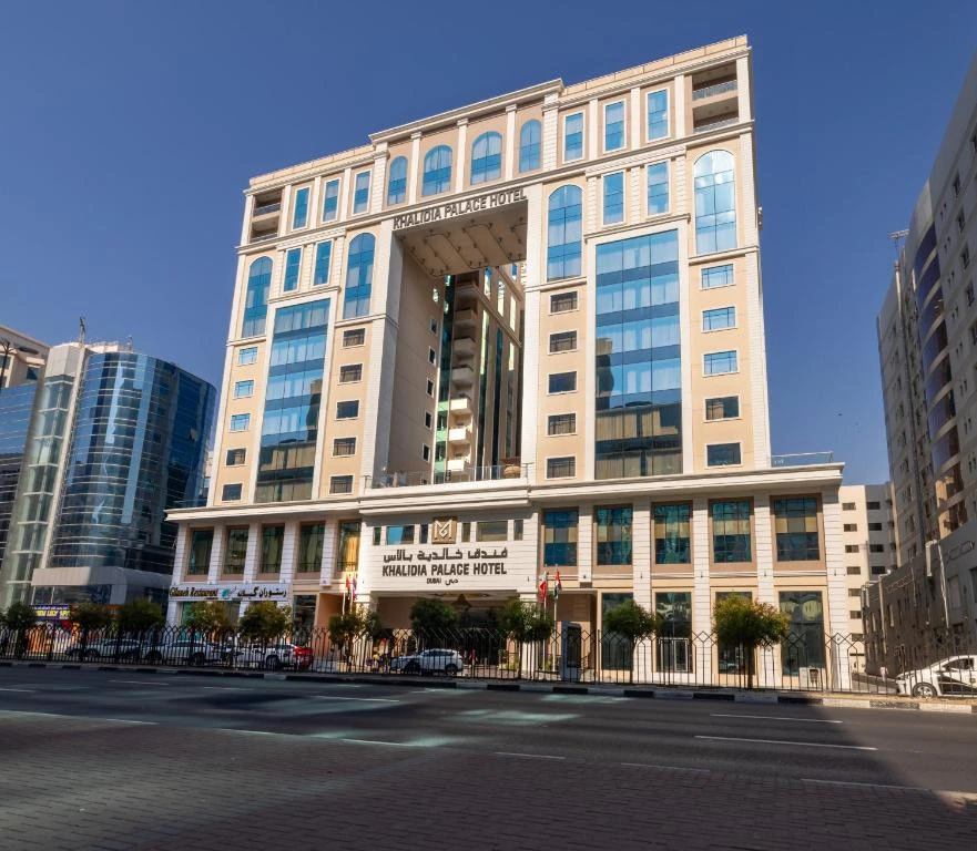 Khalidia Palace Hotel Dubai exterior with modern architecture and glass facade.