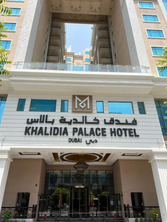 Entrance of Khalidia Palace Hotel in Dubai, modern architecture.