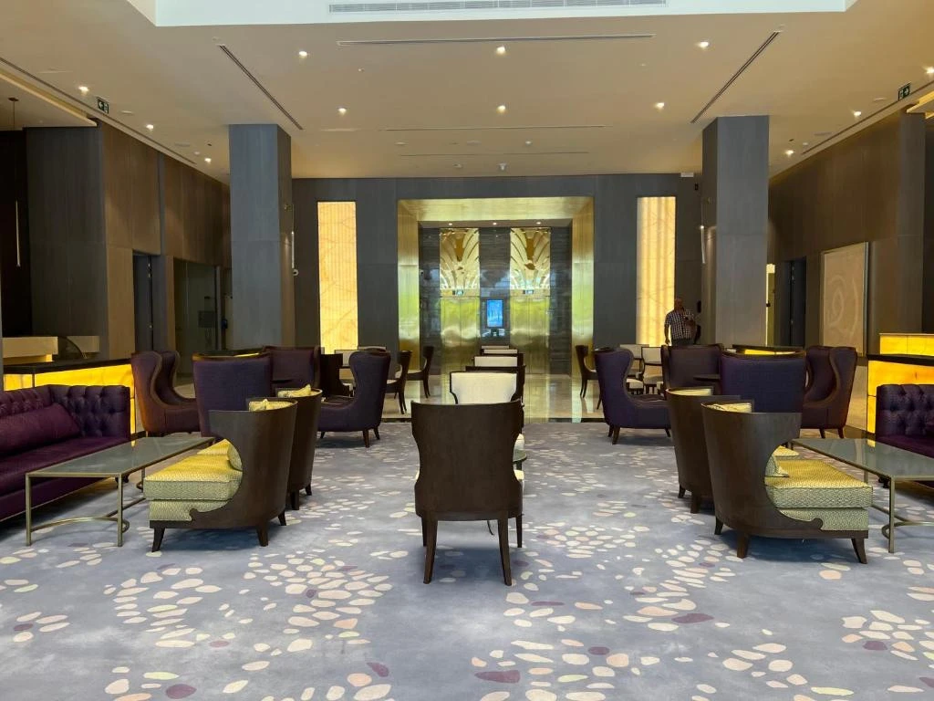 Elegant lobby with seating at Khalidia Palace Hotel, Dubai