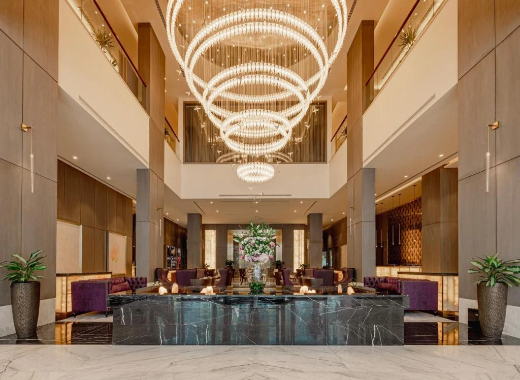 Elegant lobby with chandeliers at Khalidia Palace Hotel, Dubai.