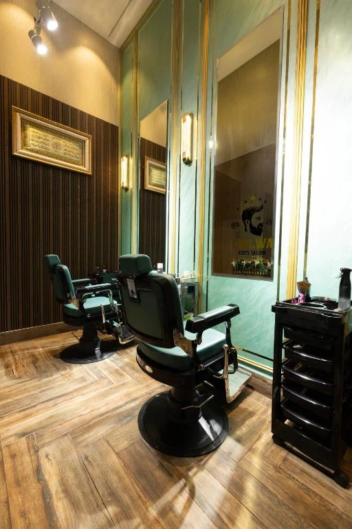 Barber chairs in Khalidia Palace Hotel Dubai salon room.