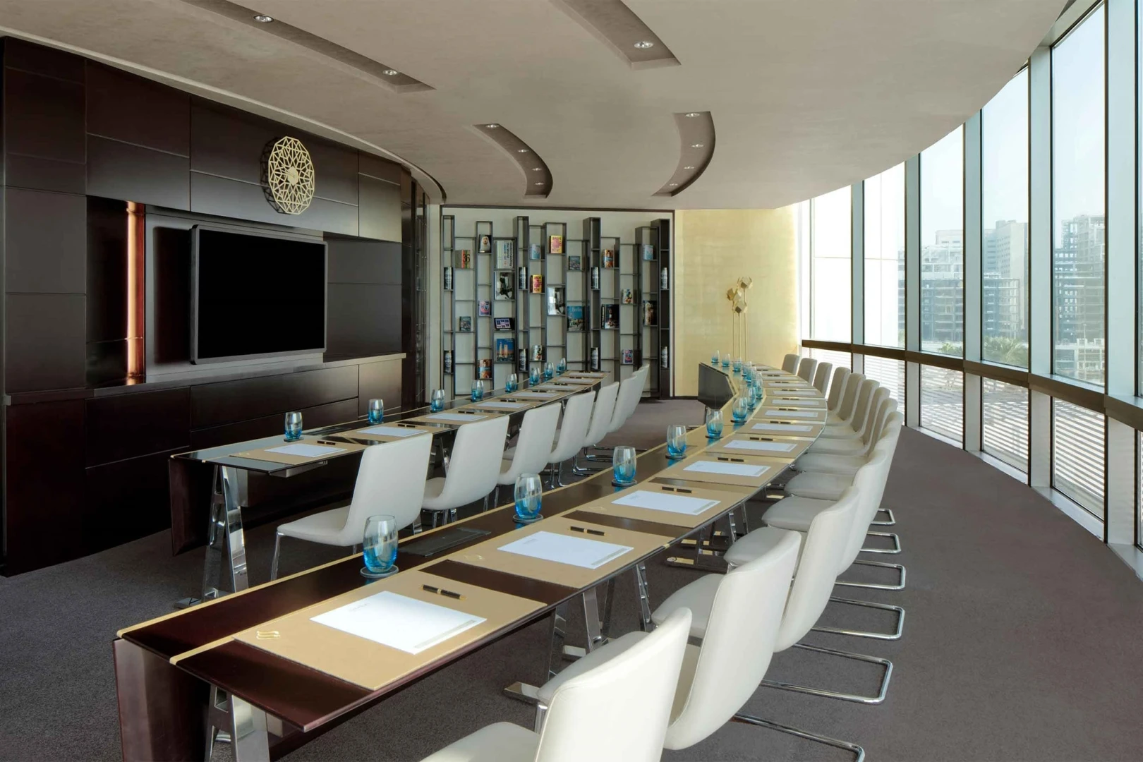 Conference room at Jumeirah Emirates Towers, Dubai with city view.