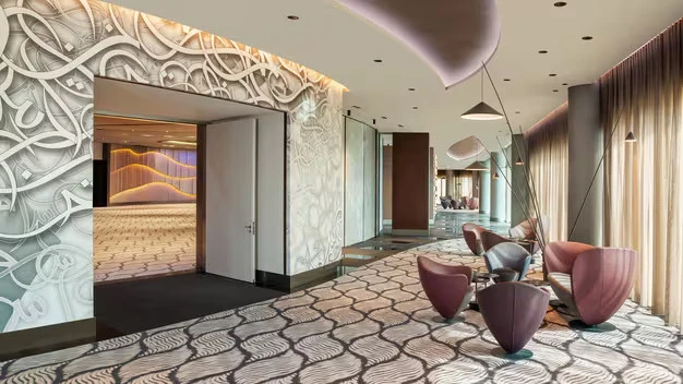 Modern interior at W Dubai - The Palm, featuring artistic decor.