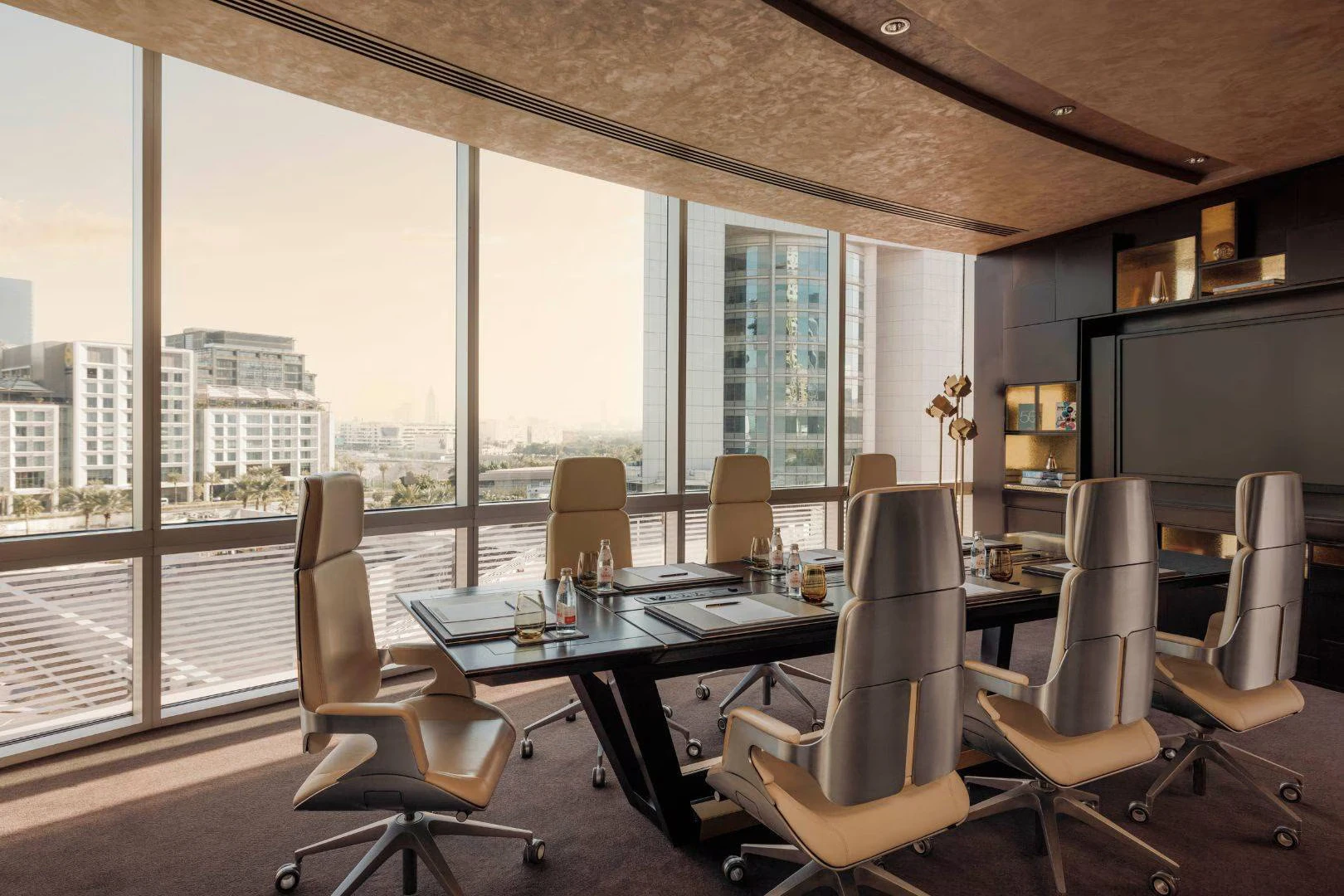 Conference room in Jumeirah Emirates Towers, Dubai with city view.