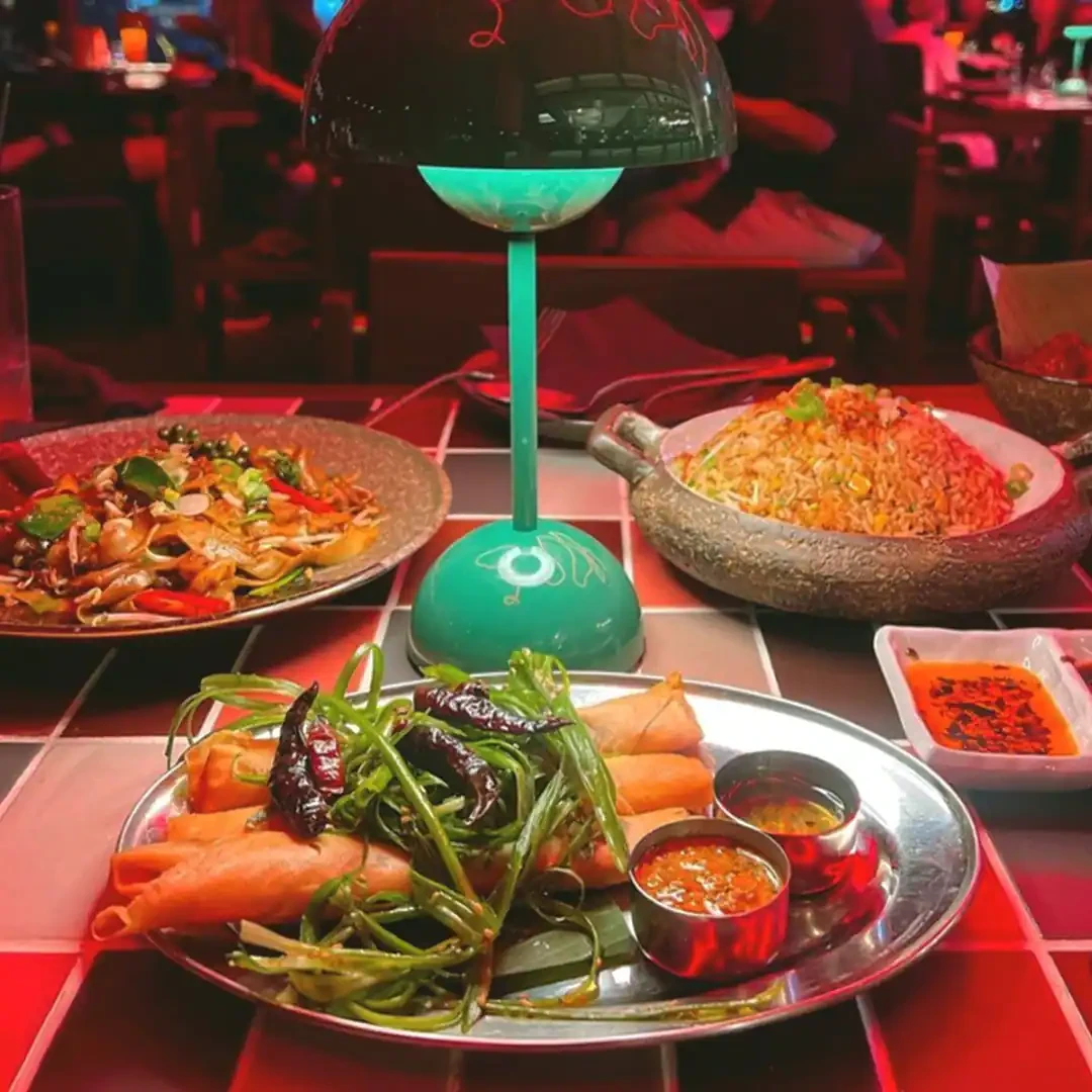 Colorful dishes at Hawkerboi, The Park JLT, Dubai restaurant.