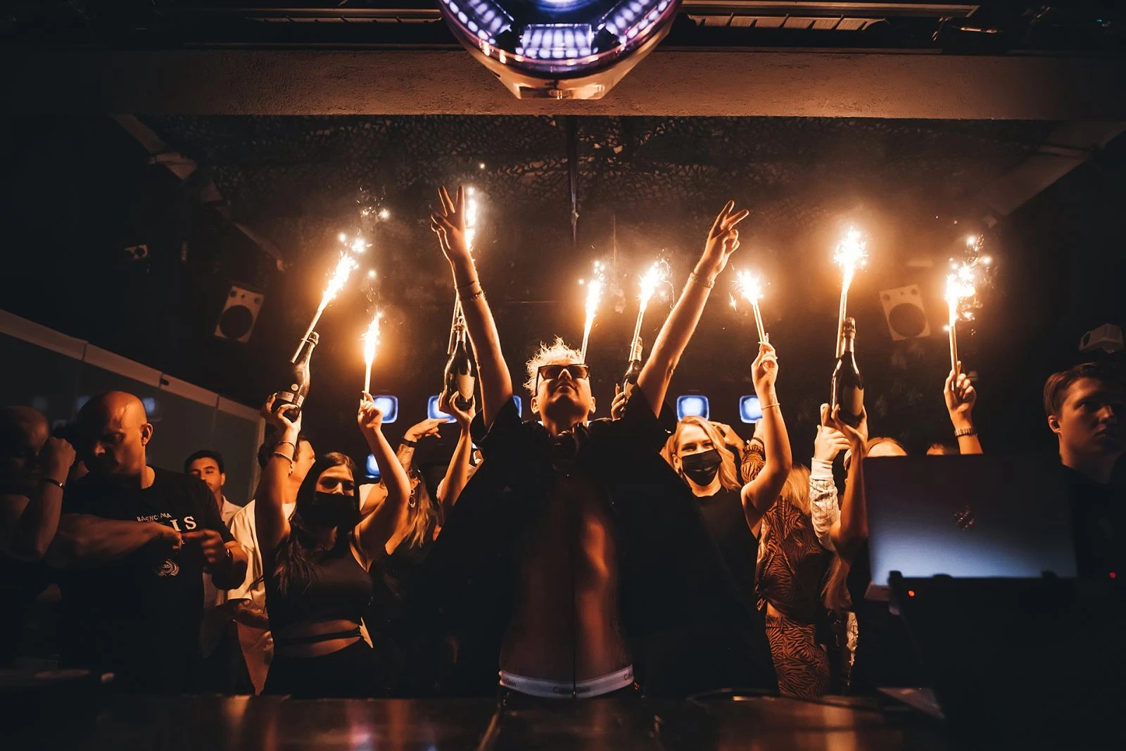 Celebration with sparklers at The Penthouse Dubai nightclub.