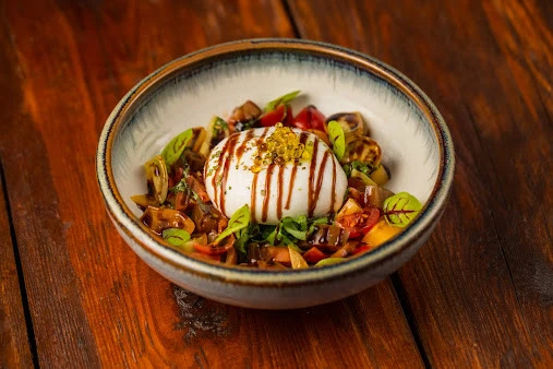 Burrata salad with tomatoes at Treehouse, Taj Dubai.