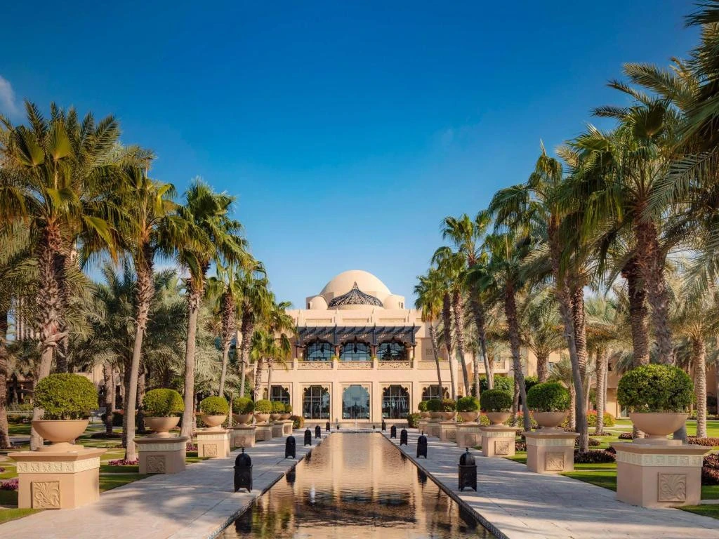 One&Only Royal Mirage entrance with palm trees, Dubai.