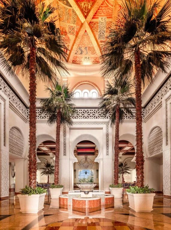 Elegant lobby with palm trees, One&Only Royal Mirage, Dubai.