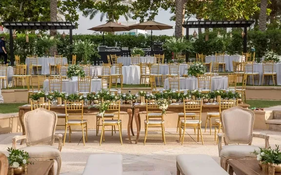 Elegant outdoor event setup at One&Only Royal Mirage, Dubai.