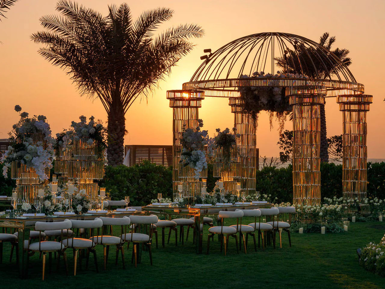 Elegant wedding setup at sunset, Jumeirah Beach Hotel, Dubai.