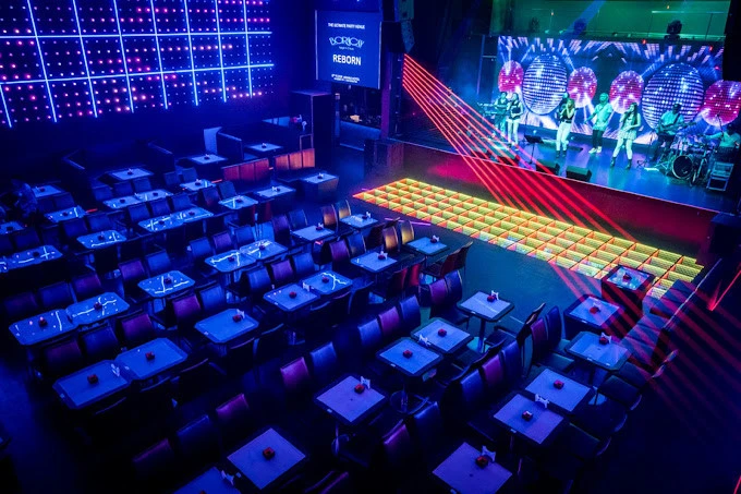 Boracay Night Club Dubai, vibrant stage lights and seating arrangement.