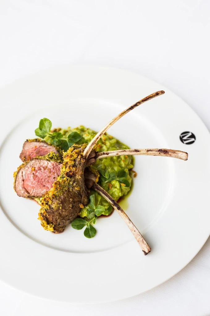 Lamb chops with greens at Atelier M, Dubai.