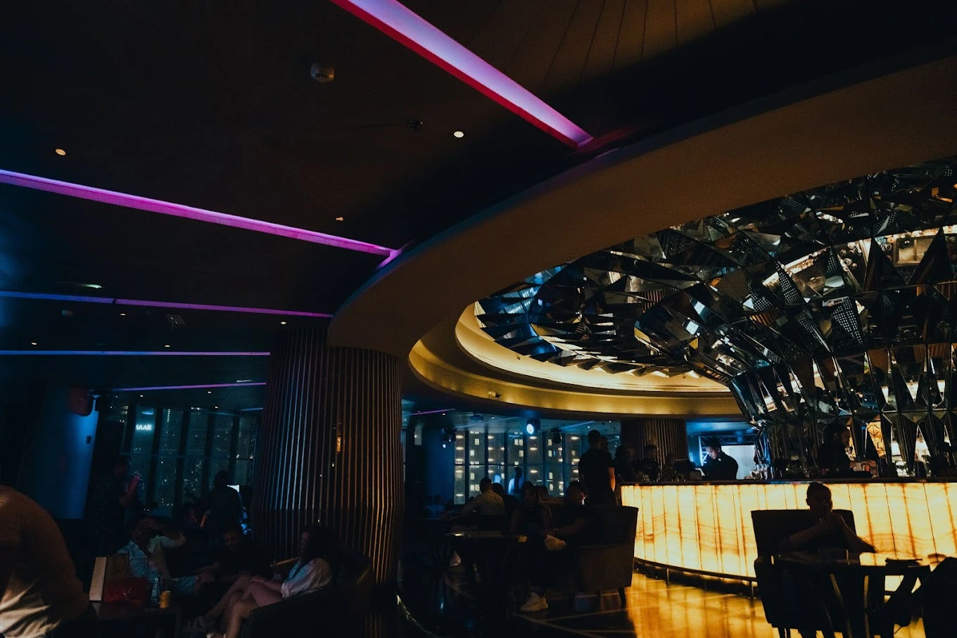 Elegant lounge at Atelier M, Dubai with modern lighting.