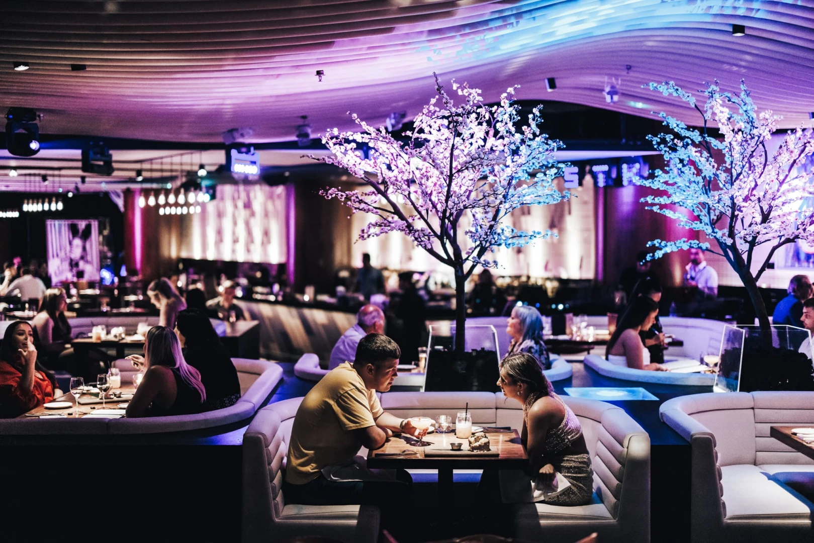 STK Dubai JBR dining area with ambient lighting and decor.