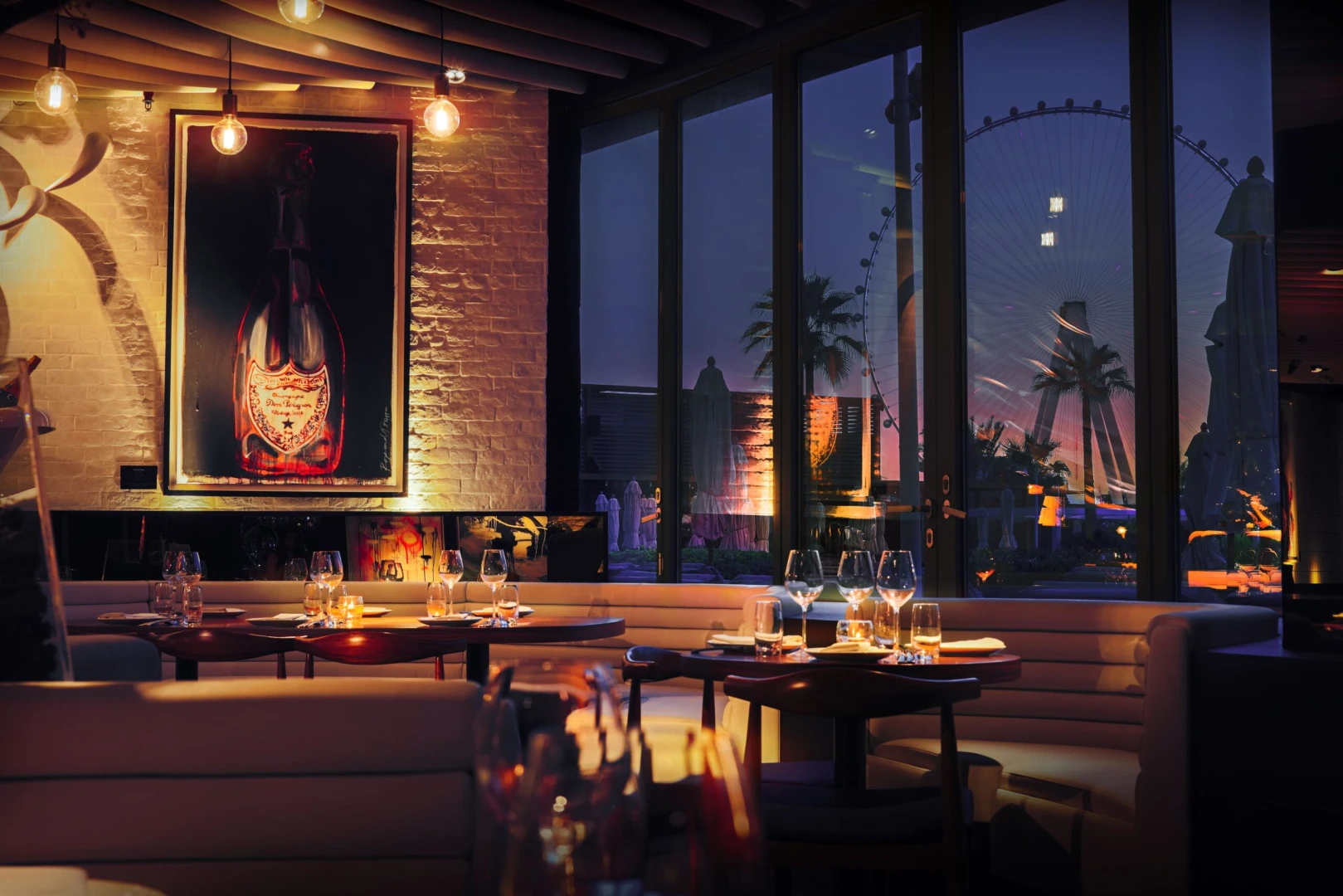 STK Dubai JBR terrace with Ain Dubai view at sunset.