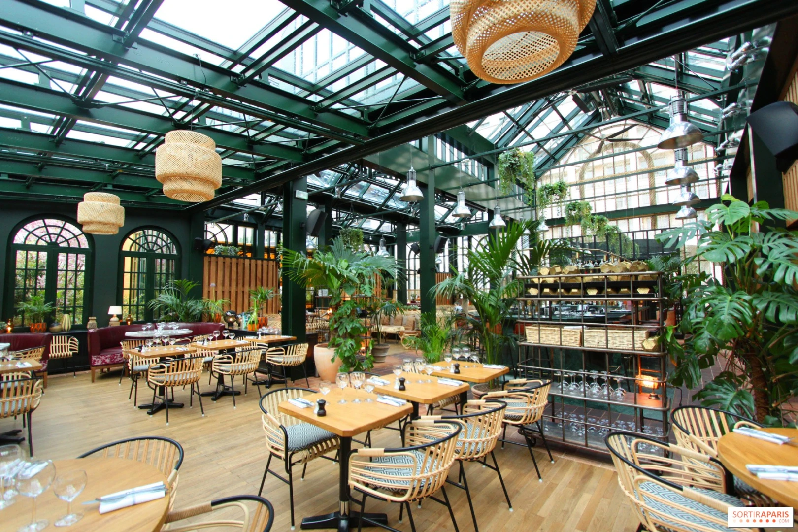 Eugène Eugène Restaurant Dubai with lush greenery and elegant seating.