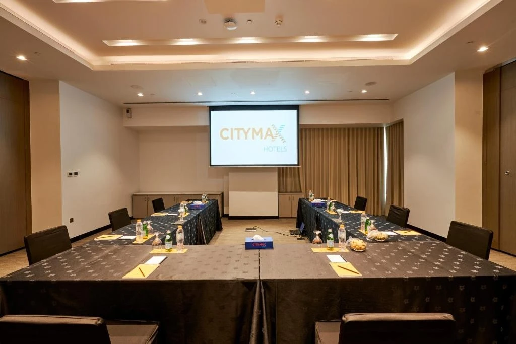Conference room at Citymax Hotel Business Bay, Dubai, with presentation setup.