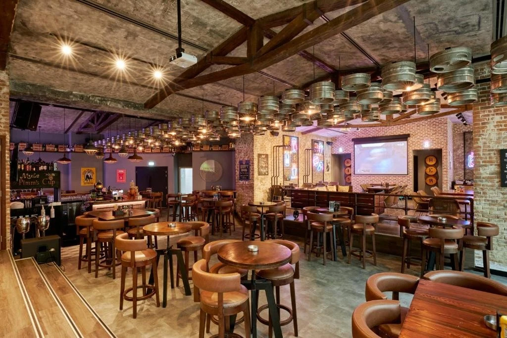 Rustic bar interior at Citymax Hotel Business Bay, Dubai.