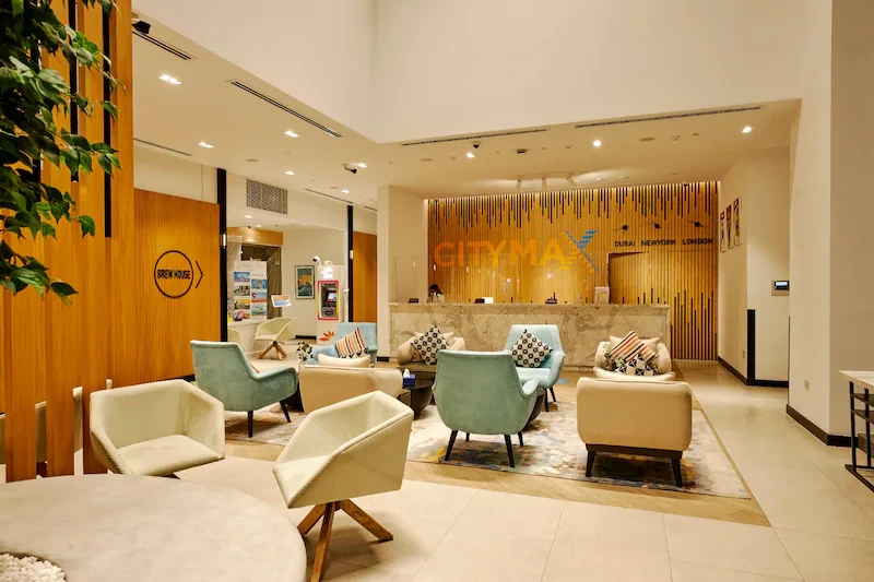 Citymax Hotel Business Bay lobby with modern seating, Dubai.
