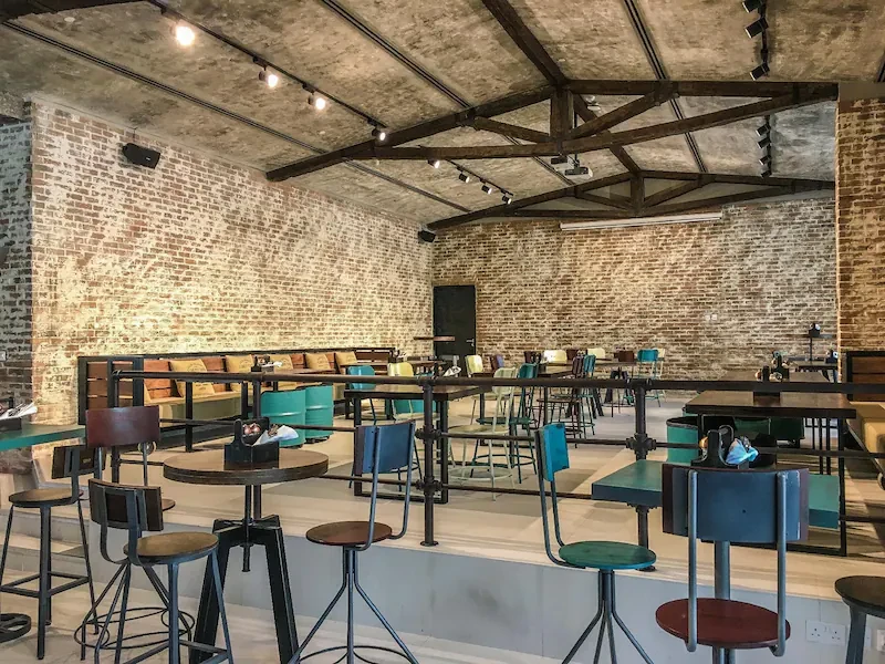 Industrial-style dining area, Citymax Hotel Business Bay, Dubai.