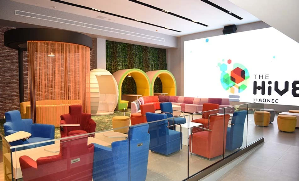 Colorful seating area at The Hive, ADNEC Centre, Abu Dhabi.