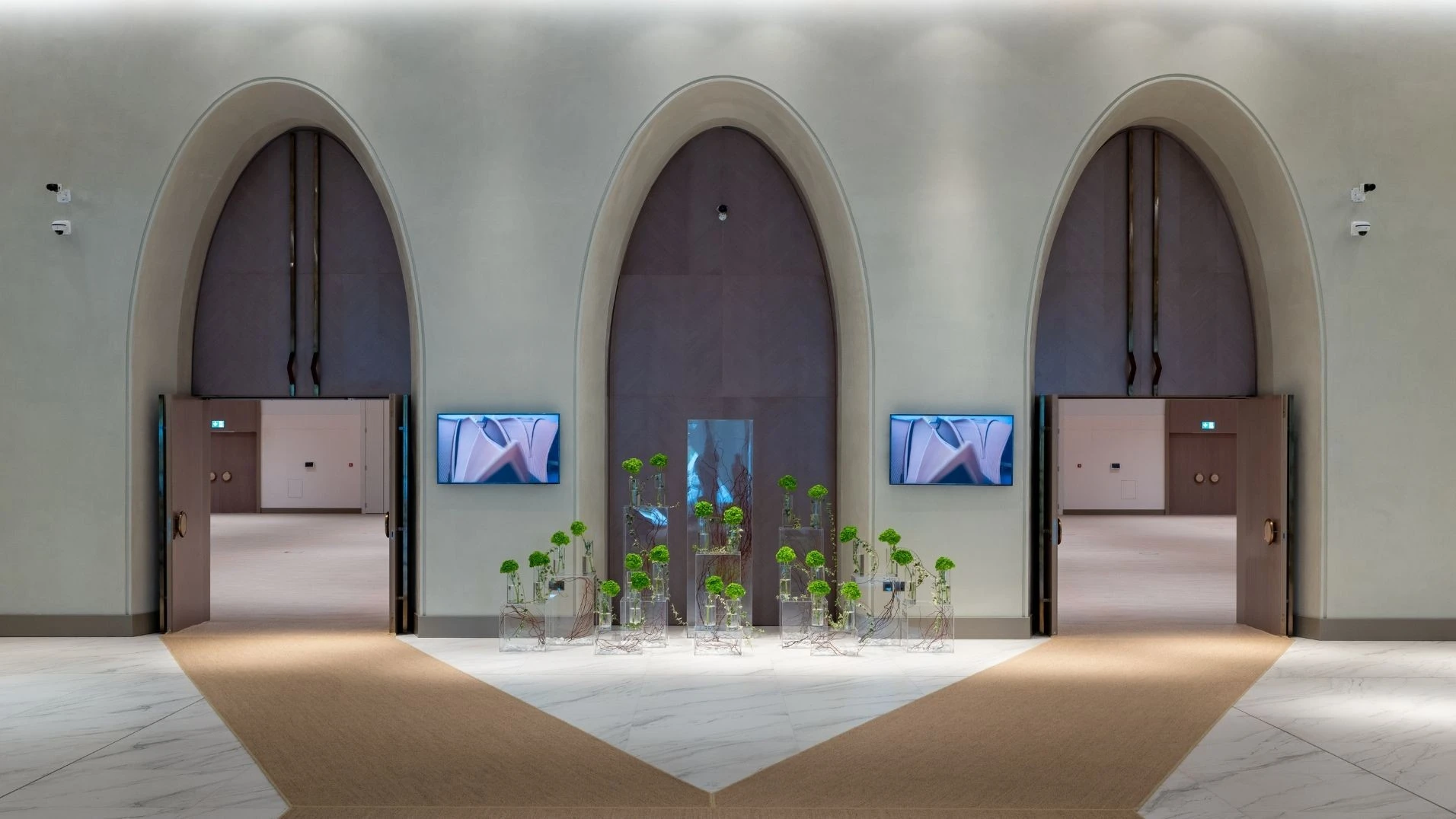 Elegant entrance at Erth Hotel Abu Dhabi with modern decor.