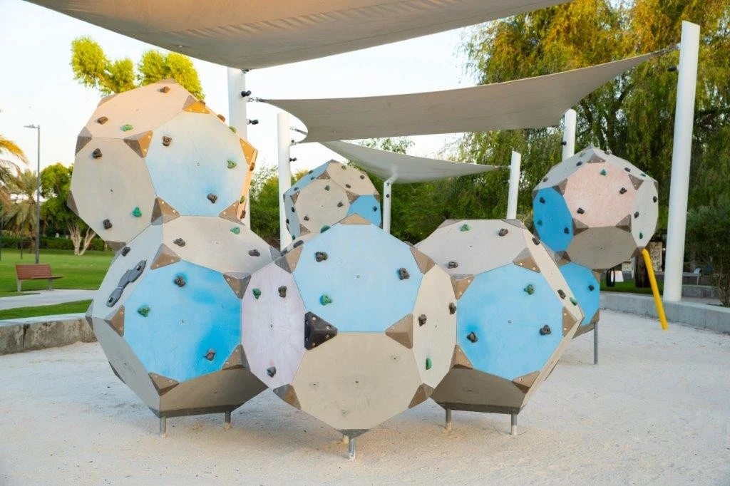 Geometric climbing structure at Umm Al Emarat Park, Abu Dhabi.