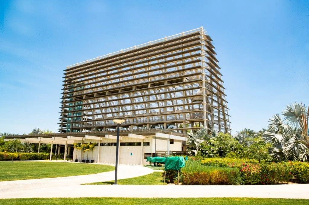 Modern building and garden at Umm Al Emarat Park, Abu Dhabi.