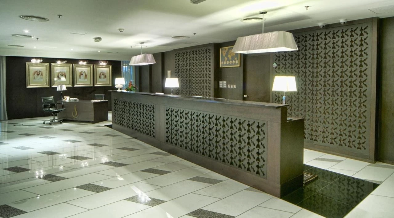 Elegant lobby of All Seasons Hotel Al Ain with modern decor.