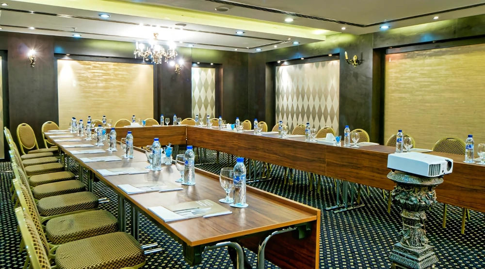 Conference room at All Seasons Hotel Al Ain, elegant setup.