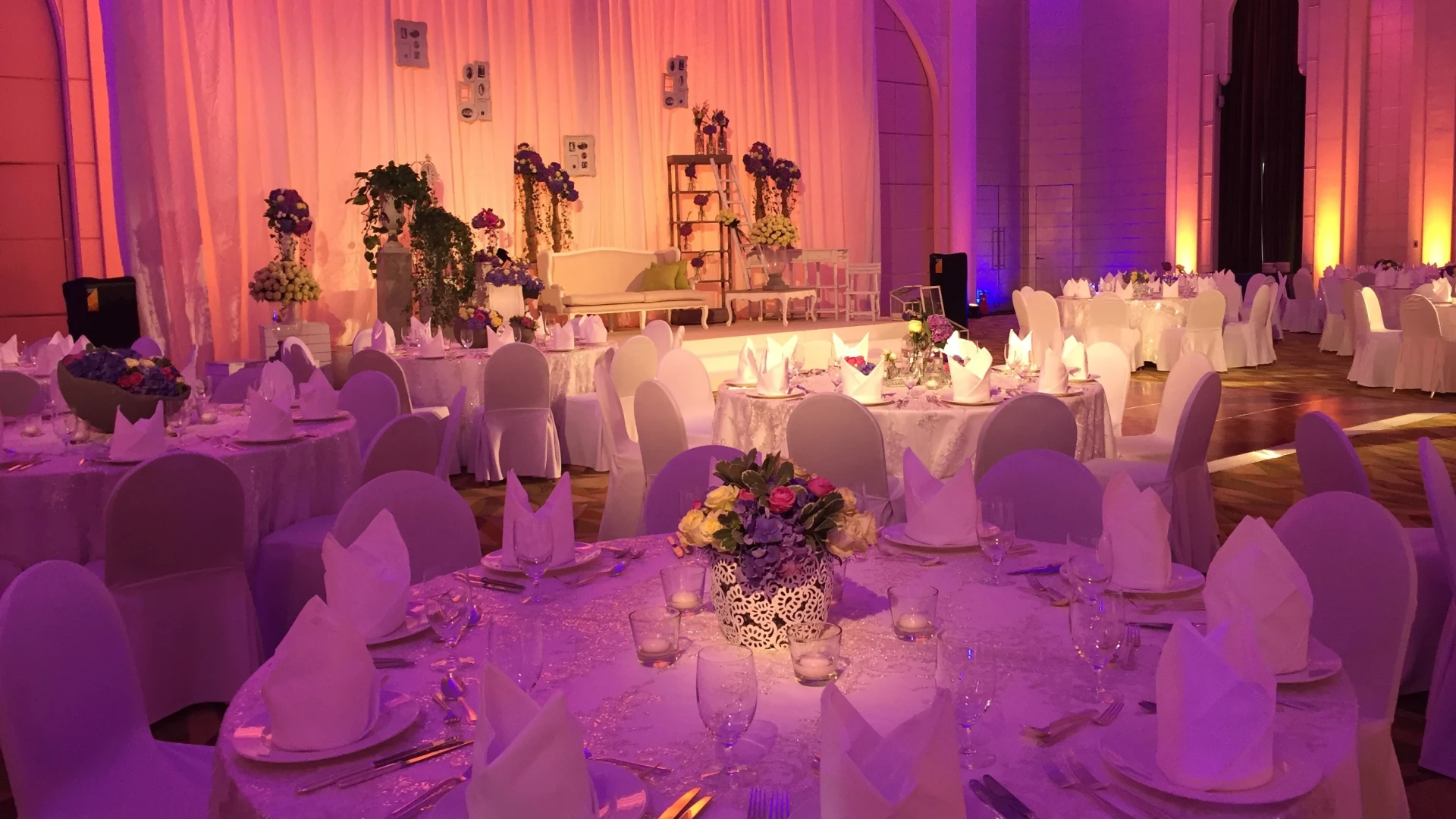 Elegant banquet setup at Shangri-La Dubai with floral centerpieces.