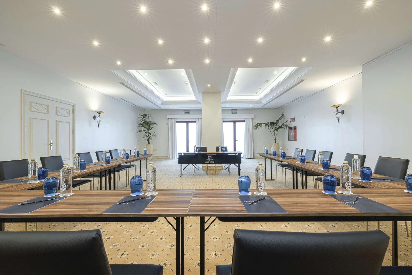 Conference room setup at Kempinski Hotel Ajman, elegant and spacious.