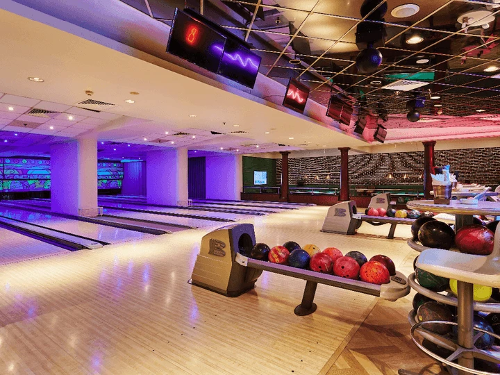 Bowling alley at Kempinski Hotel Ajman with colorful balls.