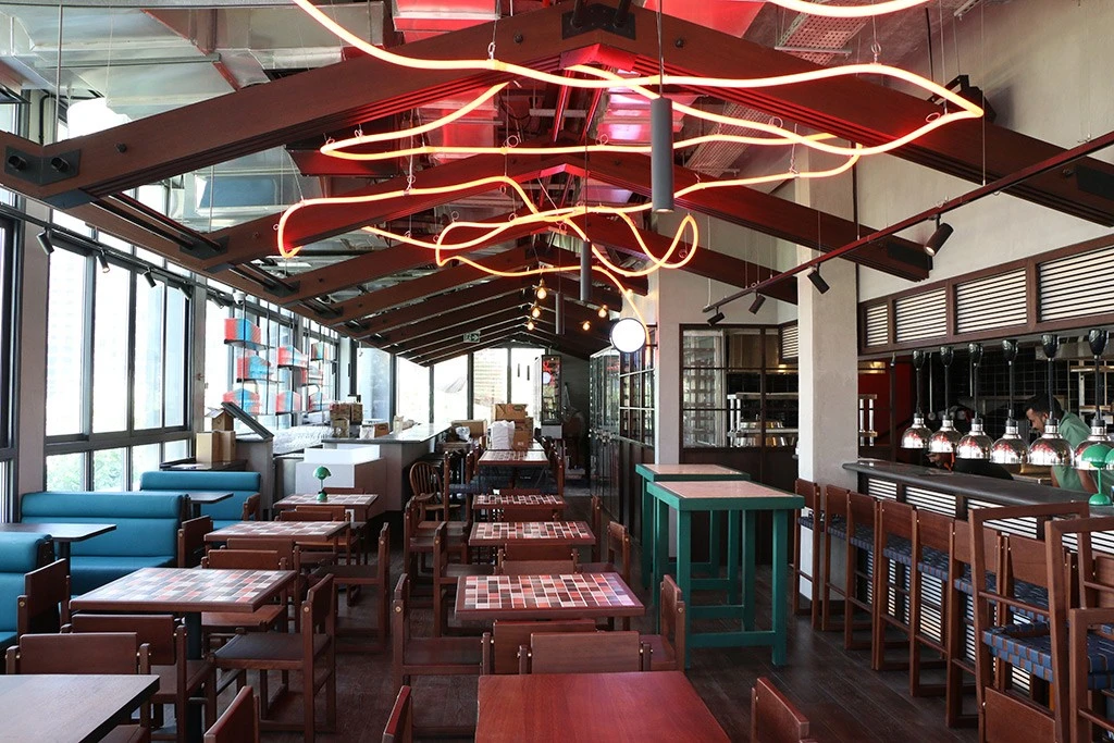 Interior of Hawkerboi, The Park JLT, Dubai with modern decor.