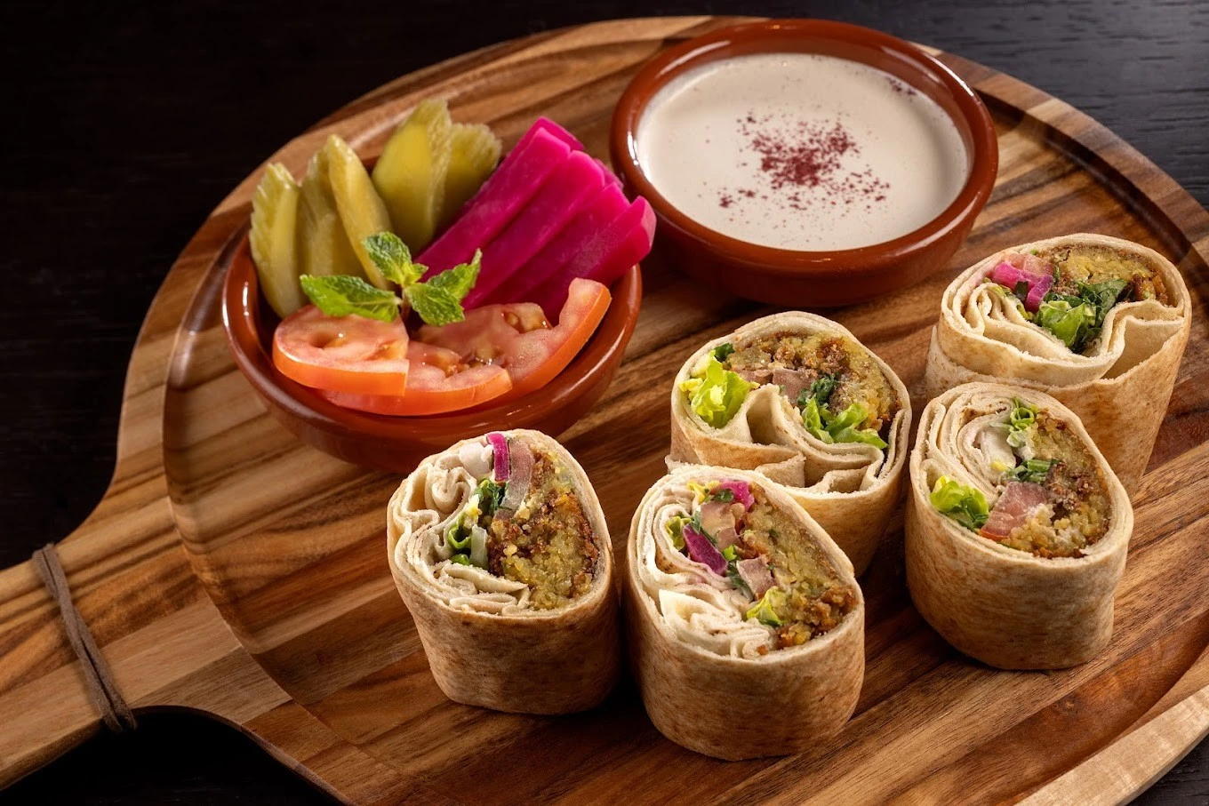 Falafel wraps with pickles and sauce at La Sirene Restaurant Dubai.