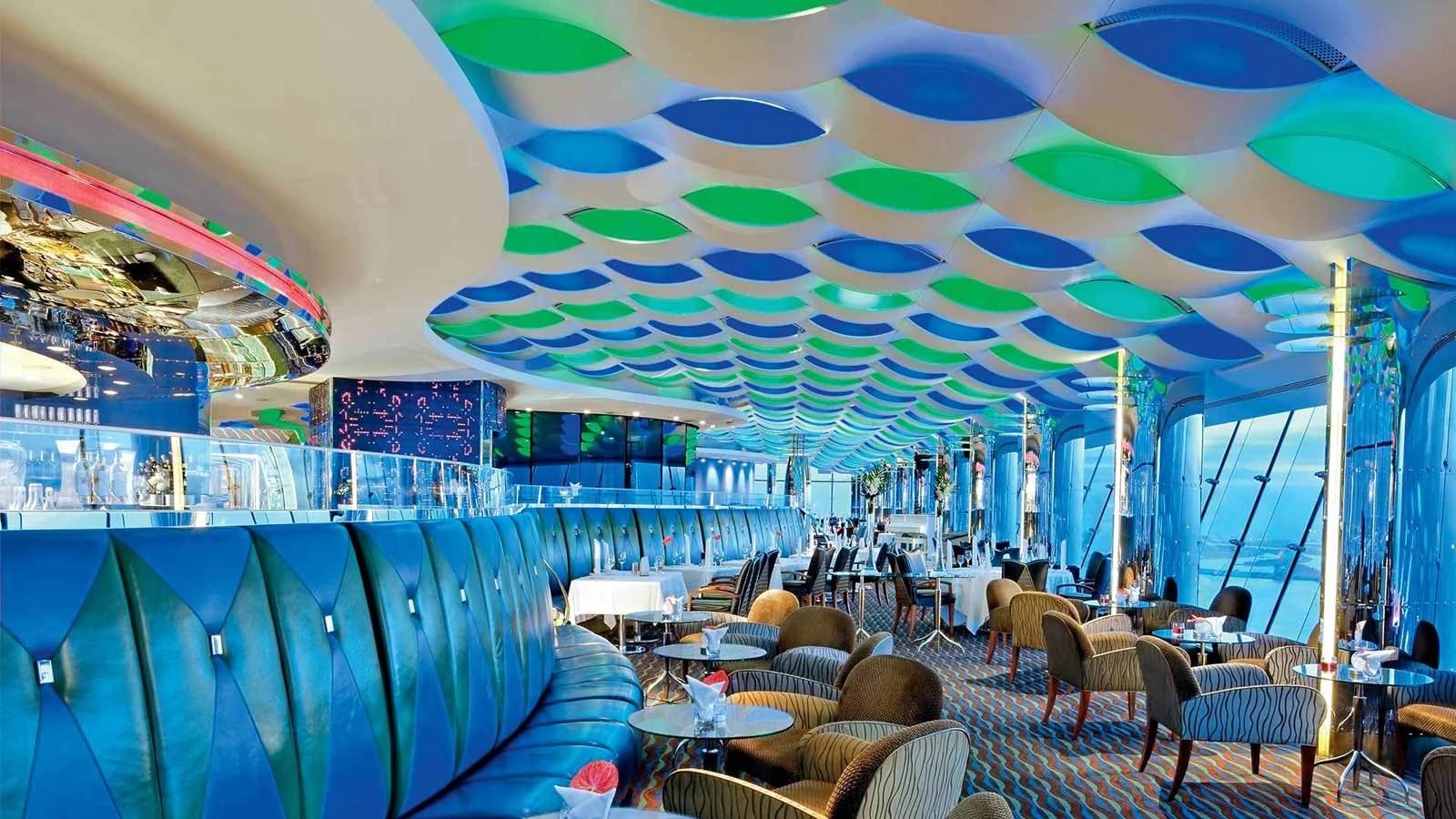 Luxurious Al Muntaha restaurant interior with colorful ceiling, Dubai.