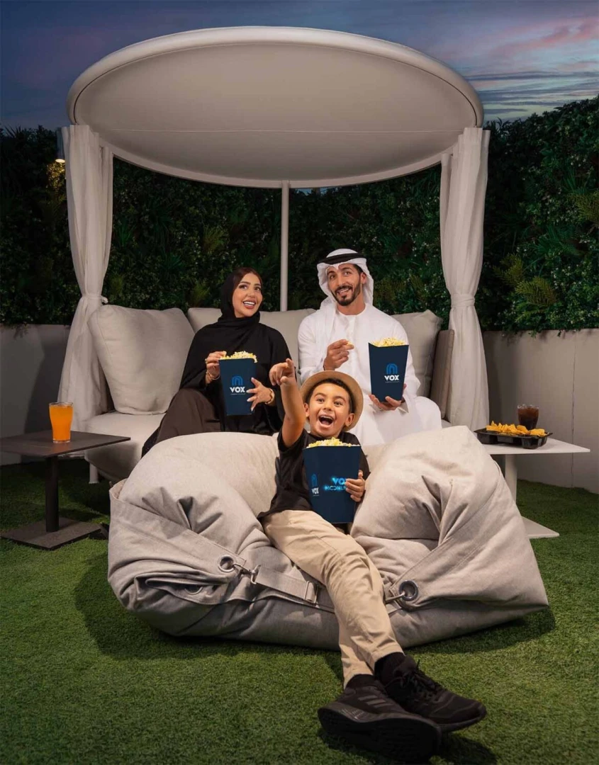 Family enjoying movie night at VOX Moonlight, Dubai.