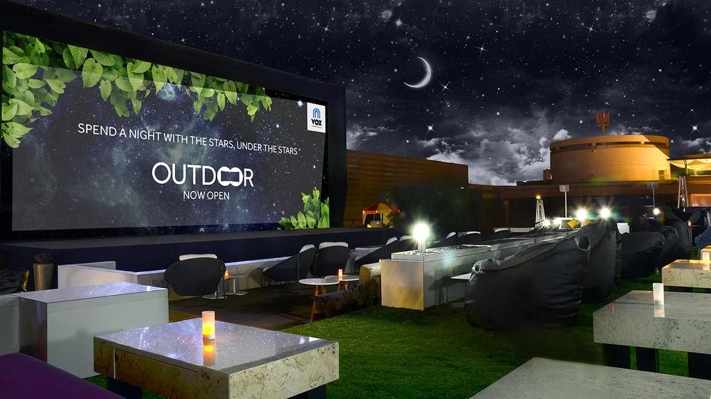 VOX Moonlight outdoor cinema under starry sky, Dubai.