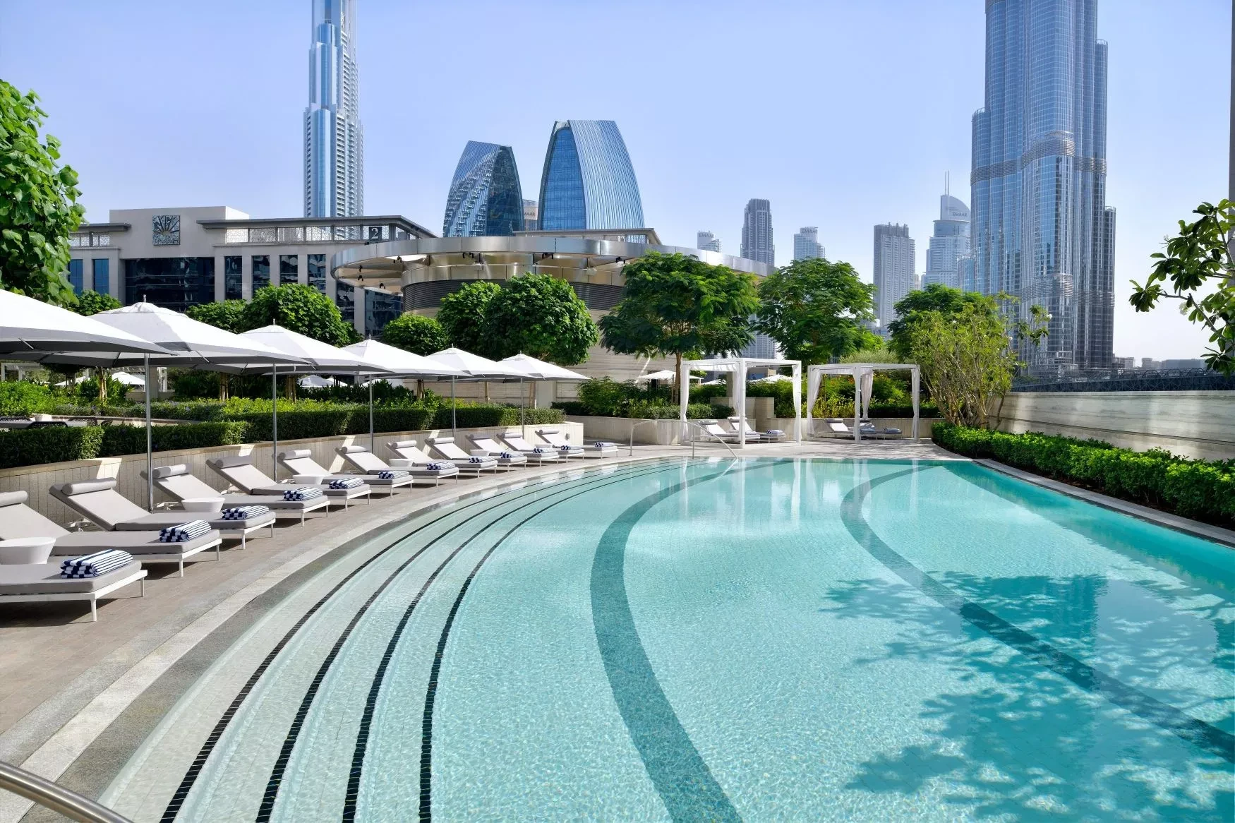 Luxurious pool with Burj Khalifa view at Address Sky View, Dubai.