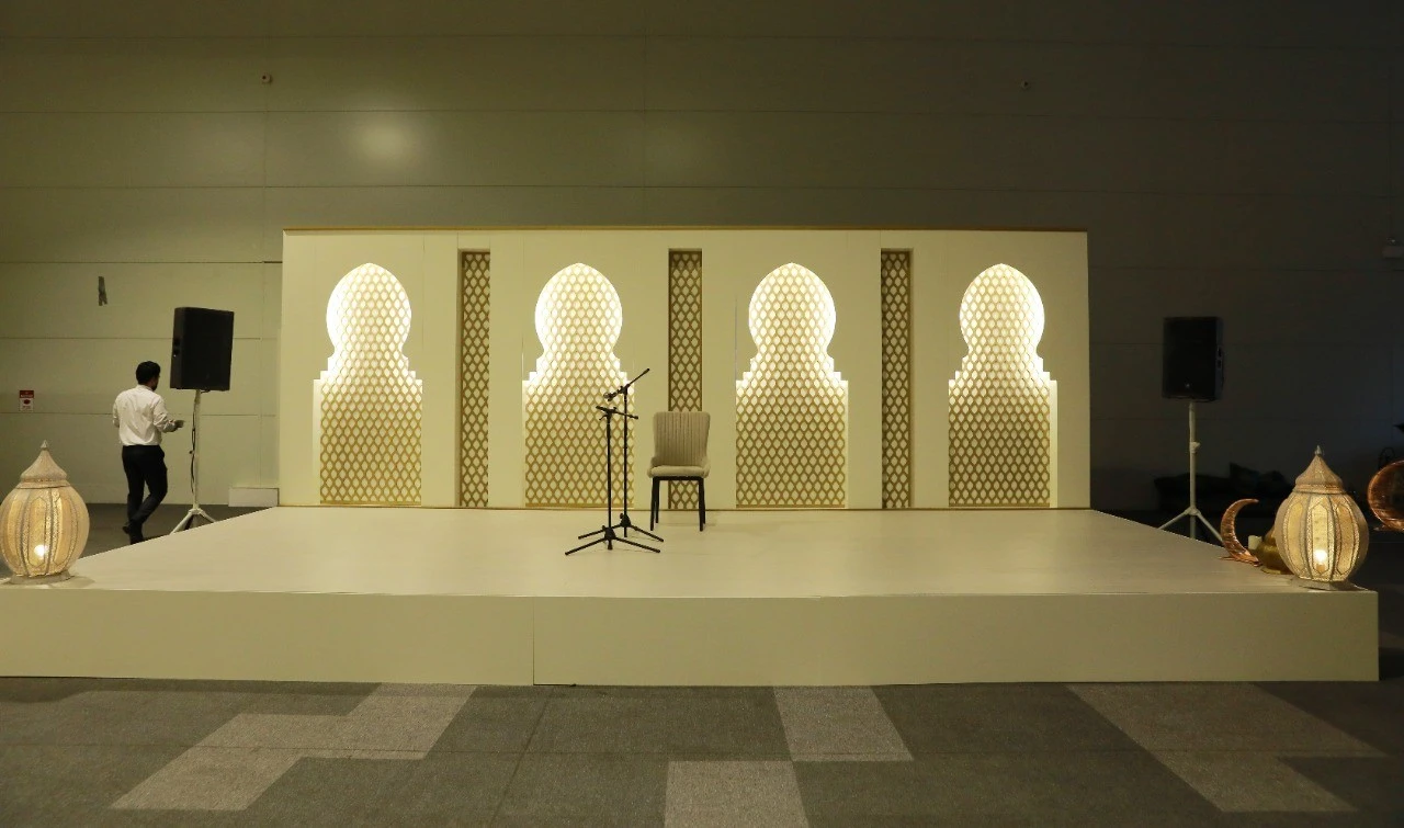 Stage with chair and microphone, Al Hamra Center, Ras Al-Khaimah