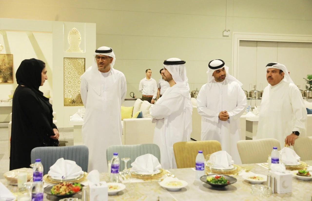 Guests conversing at Al Hamra Exhibition Center, Ras Al-Khaimah.