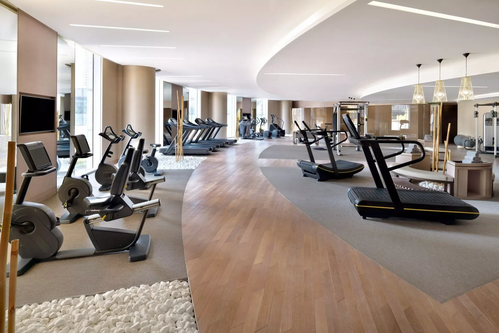 Modern gym at Address Sky View, Dubai with treadmills and equipment.