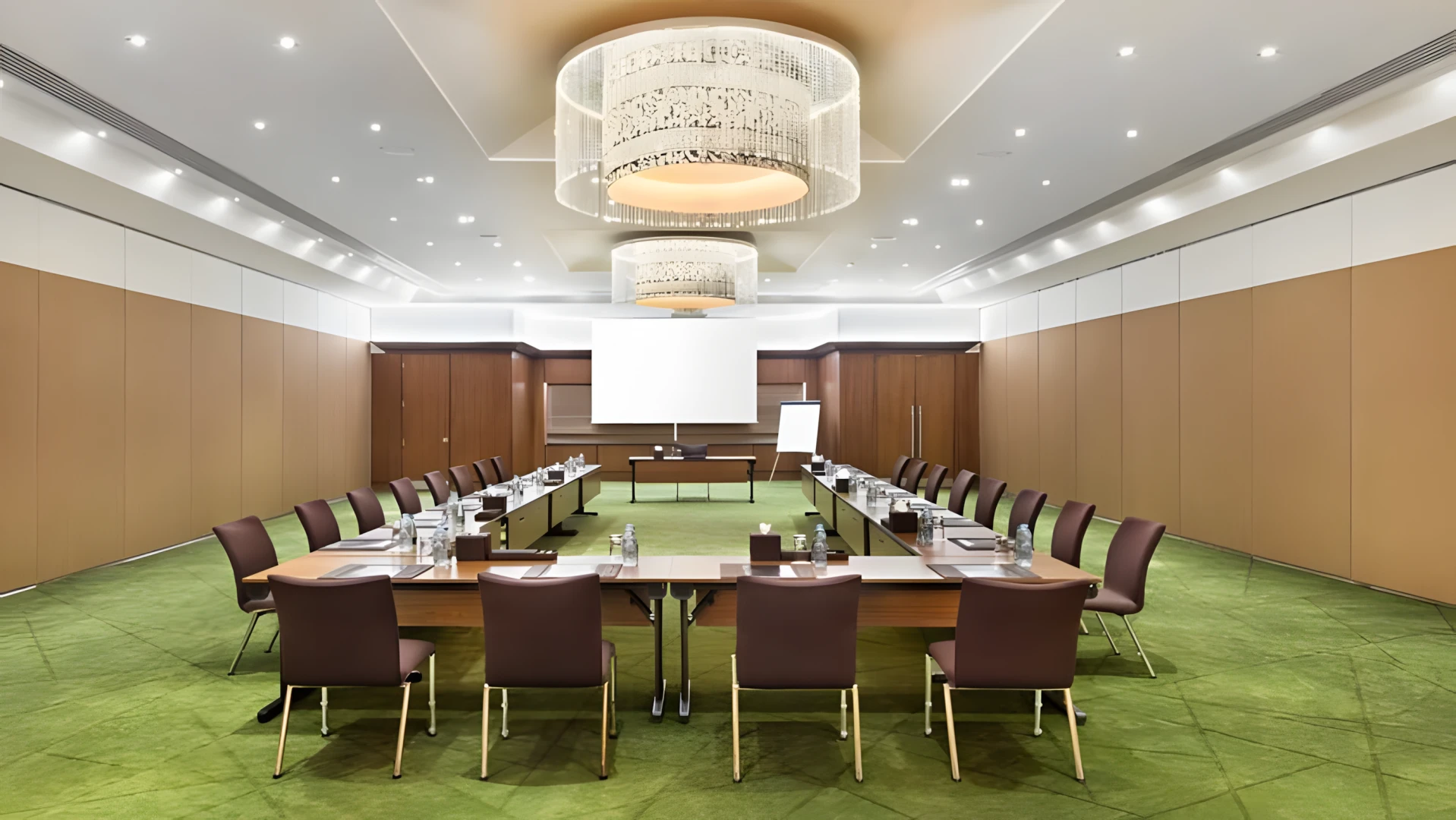 Conference room at JA Beach Hotel, Dubai, with U-shaped table setup.